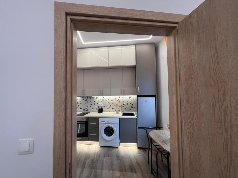 Kitchen or kitchenette, washing machine