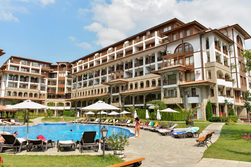 Property building, Patio, Pool view, Swimming pool, sunbed