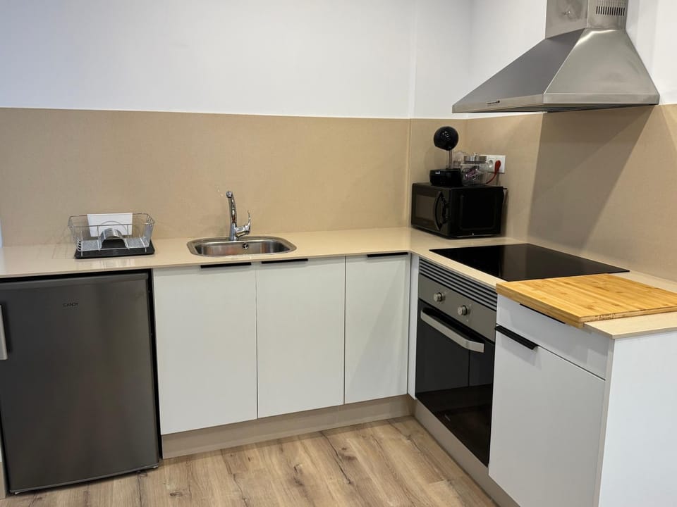 Kitchen or kitchenette, oven
