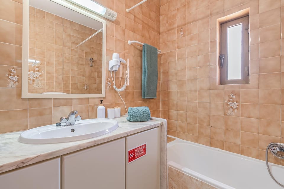 Toilet, Bath, hair dryier, towels