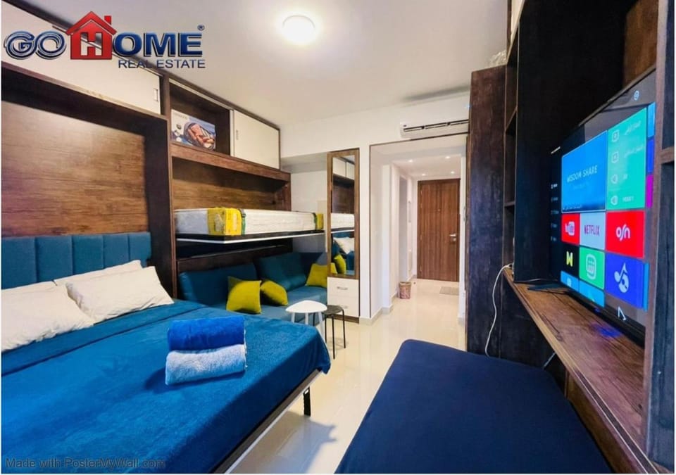 Bed, TV and multimedia, Living room, Photo of the whole room, Seating area, Evening entertainment, Bedroom, air conditioner