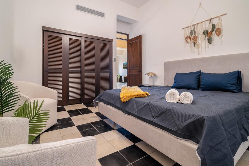 Bed, Living room, Seating area, Bedroom