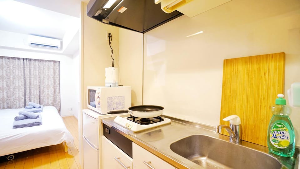 Bed, Kitchen or kitchenette, Bedroom, stove, towels