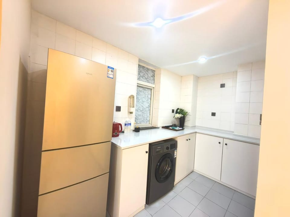 Kitchen or kitchenette, washing machine