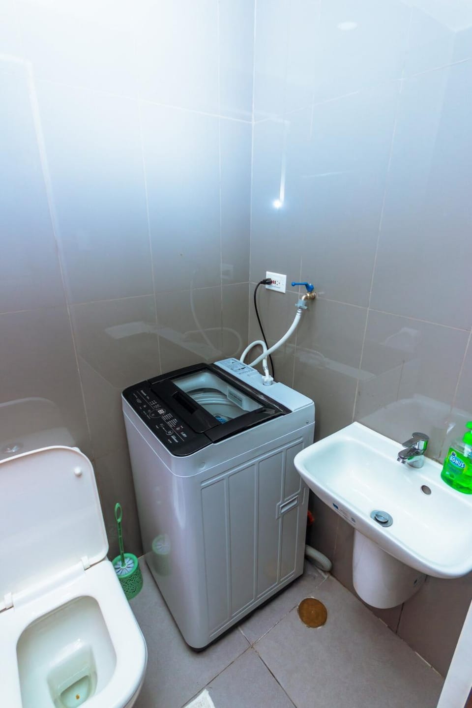 Toilet, Bathroom, towels, washing machine, dryer