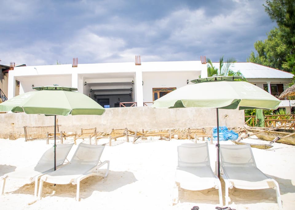 Property building, Beach, Sea view, sunbed