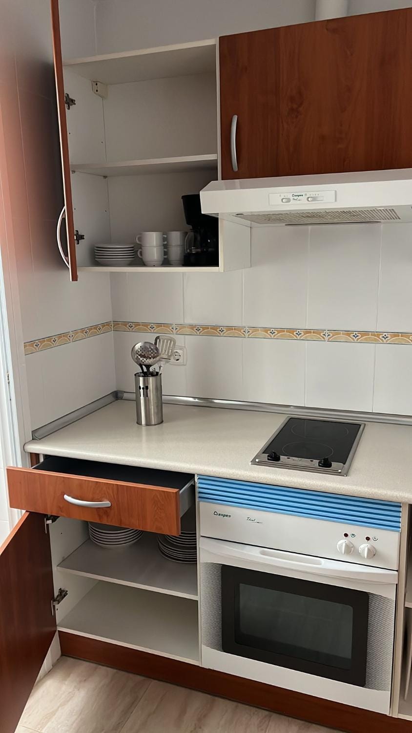 Kitchen or kitchenette, stove