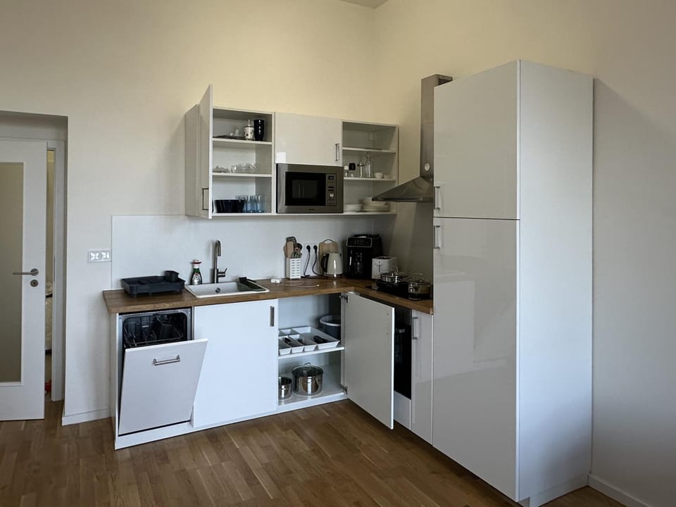 Kitchen or kitchenette, dishwasher, oven, stove, toaster