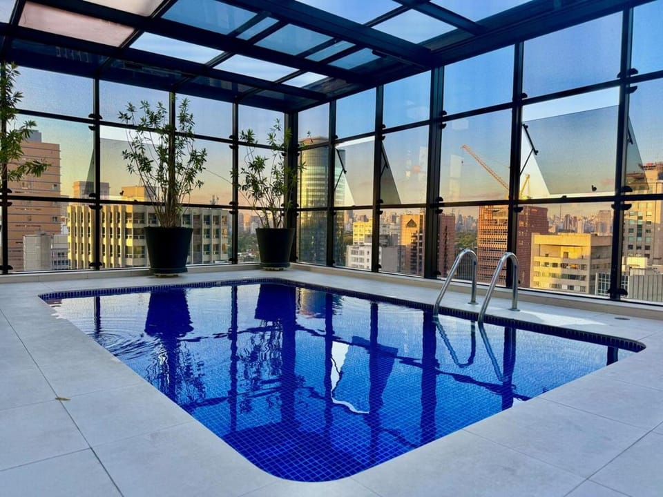 Swimming pool, sunbed