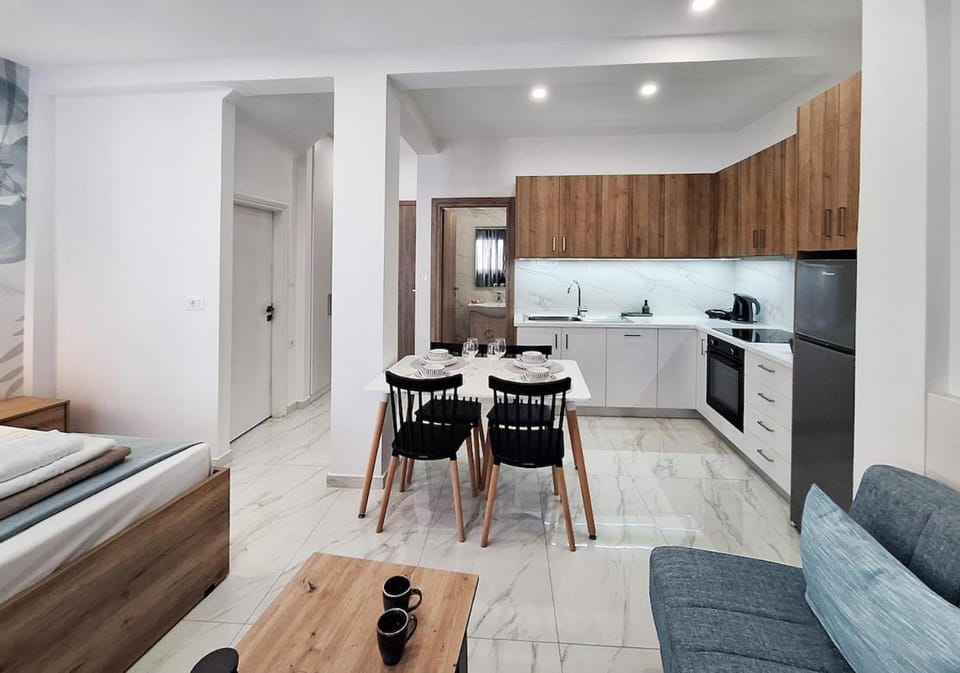 Kitchen or kitchenette, Living room, Seating area, Dining area