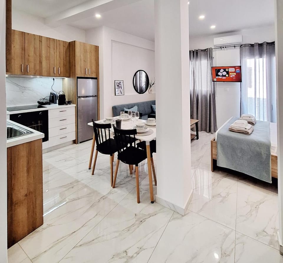 Bed, Kitchen or kitchenette, Living room, Seating area, Dining area