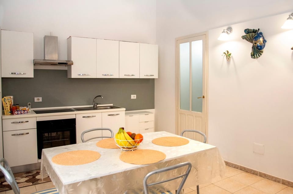 Kitchen or kitchenette, stove, kitchen