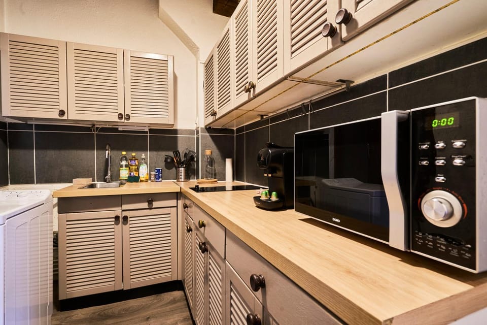Kitchen or kitchenette, stove