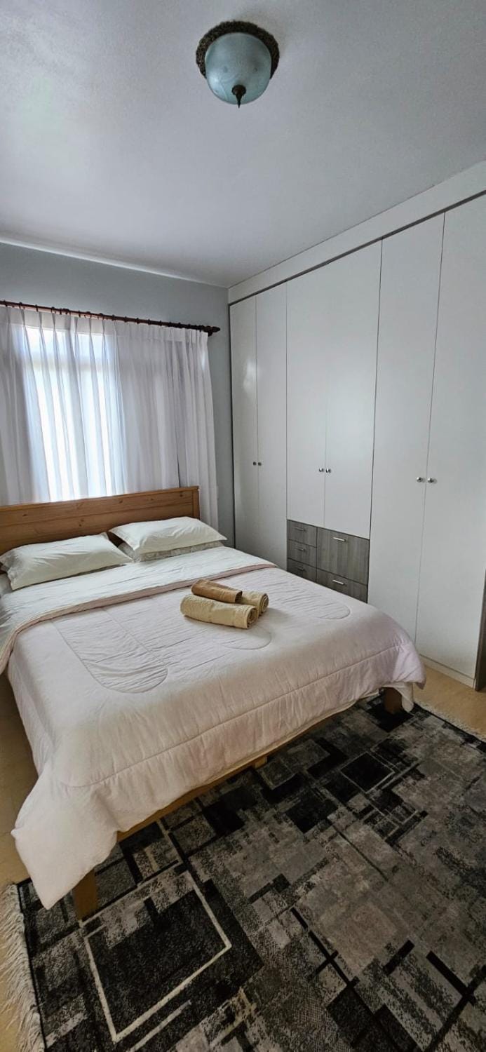 Bed, Photo of the whole room, Bedroom, towels, wardrobe