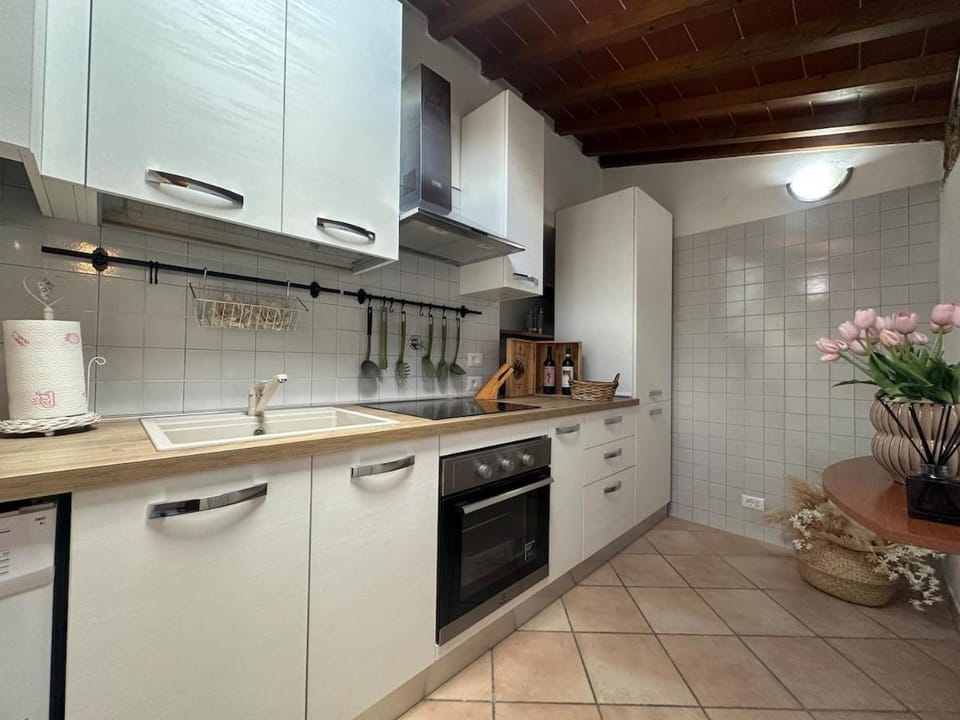 Kitchen or kitchenette, oven, stove