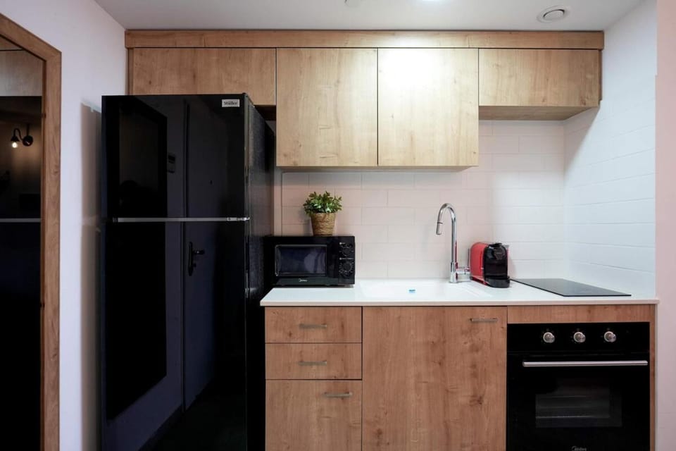 Kitchen or kitchenette, oven, stove
