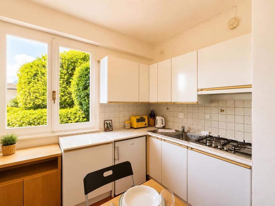 Kitchen or kitchenette, stove, kitchen