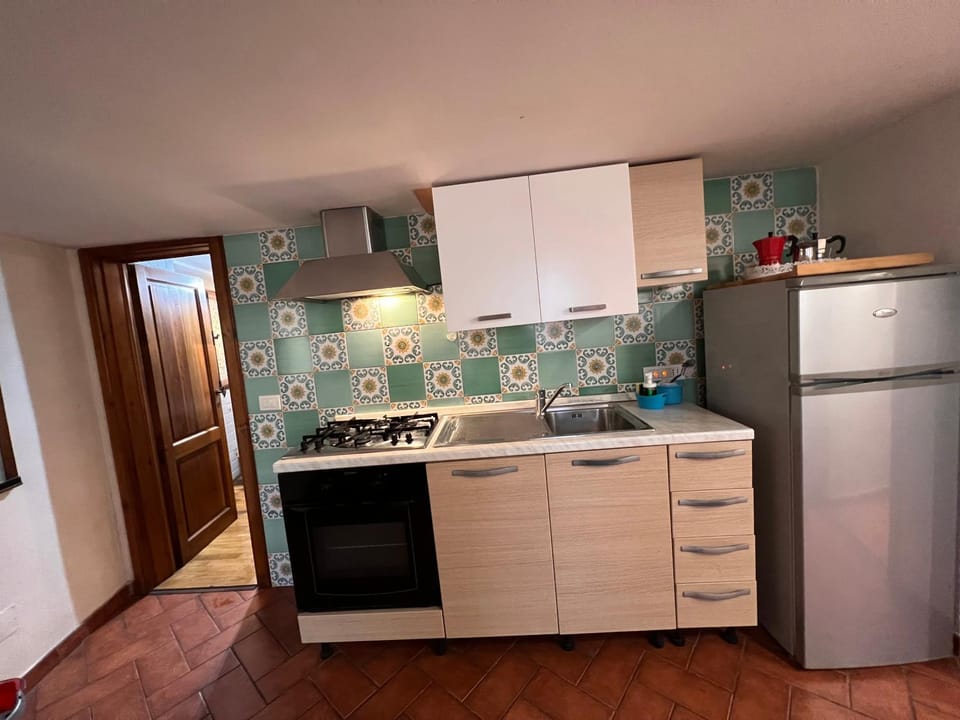 Kitchen or kitchenette, stove