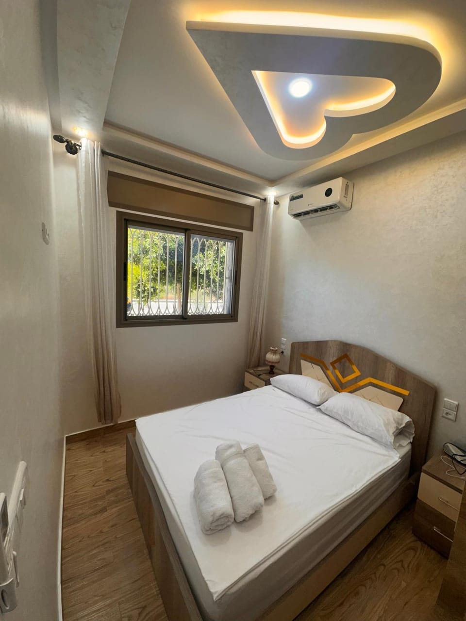Bed, Photo of the whole room, Bedroom, towels, air conditioner