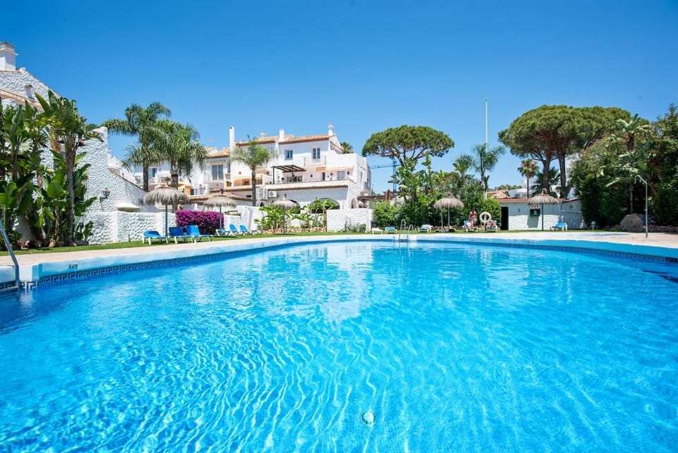 Property building, Day, Natural landscape, Pool view, Swimming pool, Swimming pool, sunbed