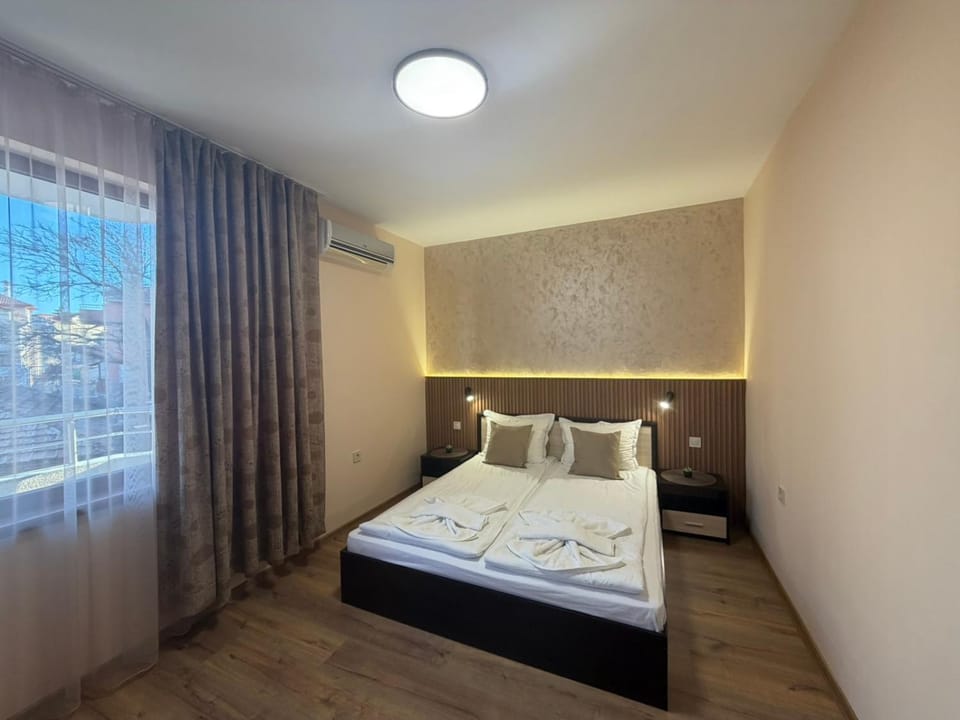 Photo of the whole room, Bedroom, towels, air conditioner