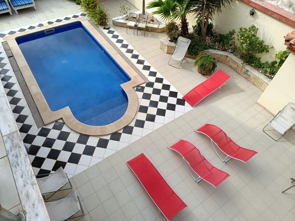 Patio, Day, Pool view, Swimming pool, sunbed