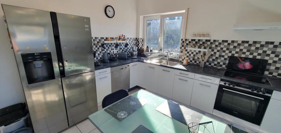 Kitchen or kitchenette, dishwasher, oven, stove, toaster