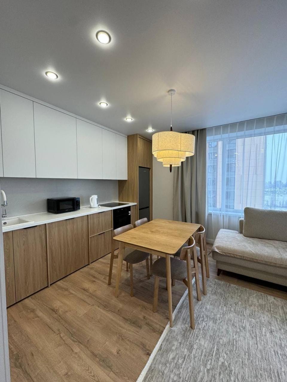 Kitchen or kitchenette, Living room, Seating area, Dining area