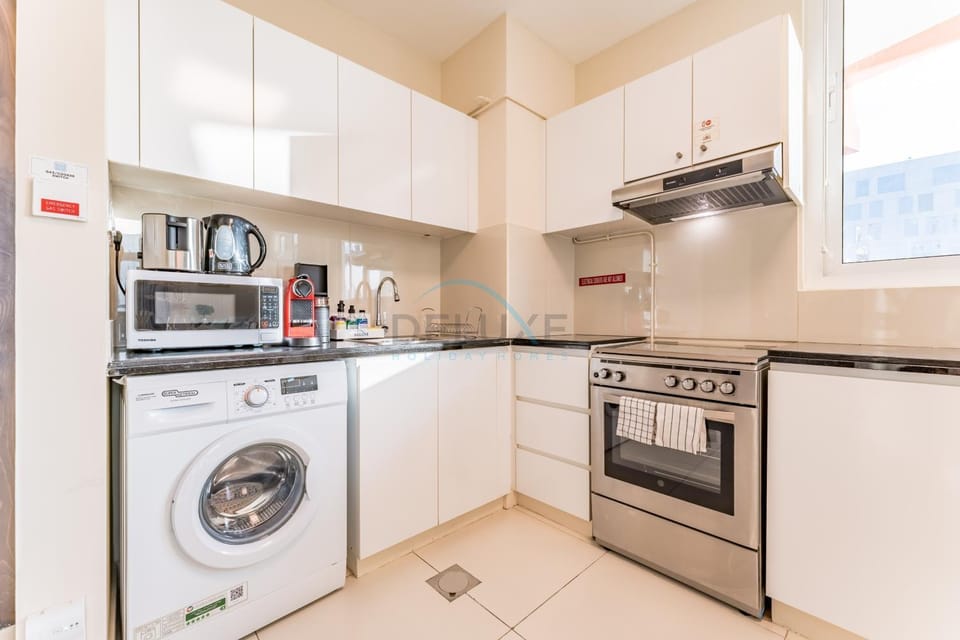 microwave, oven, stove, toaster, washing machine, kitchen