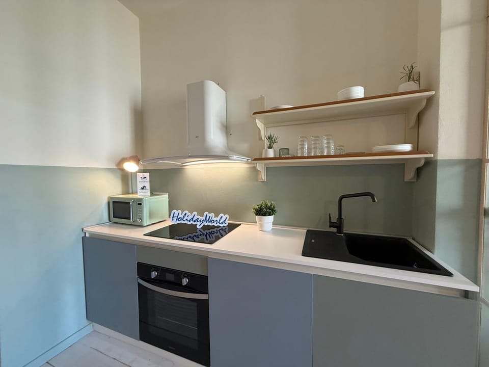 Kitchen or kitchenette, oven, stove