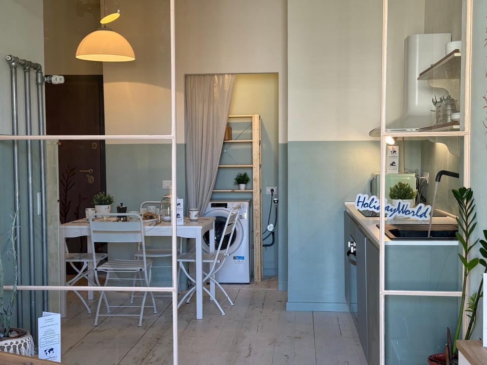 Kitchen or kitchenette, Dining area, stove, washing machine