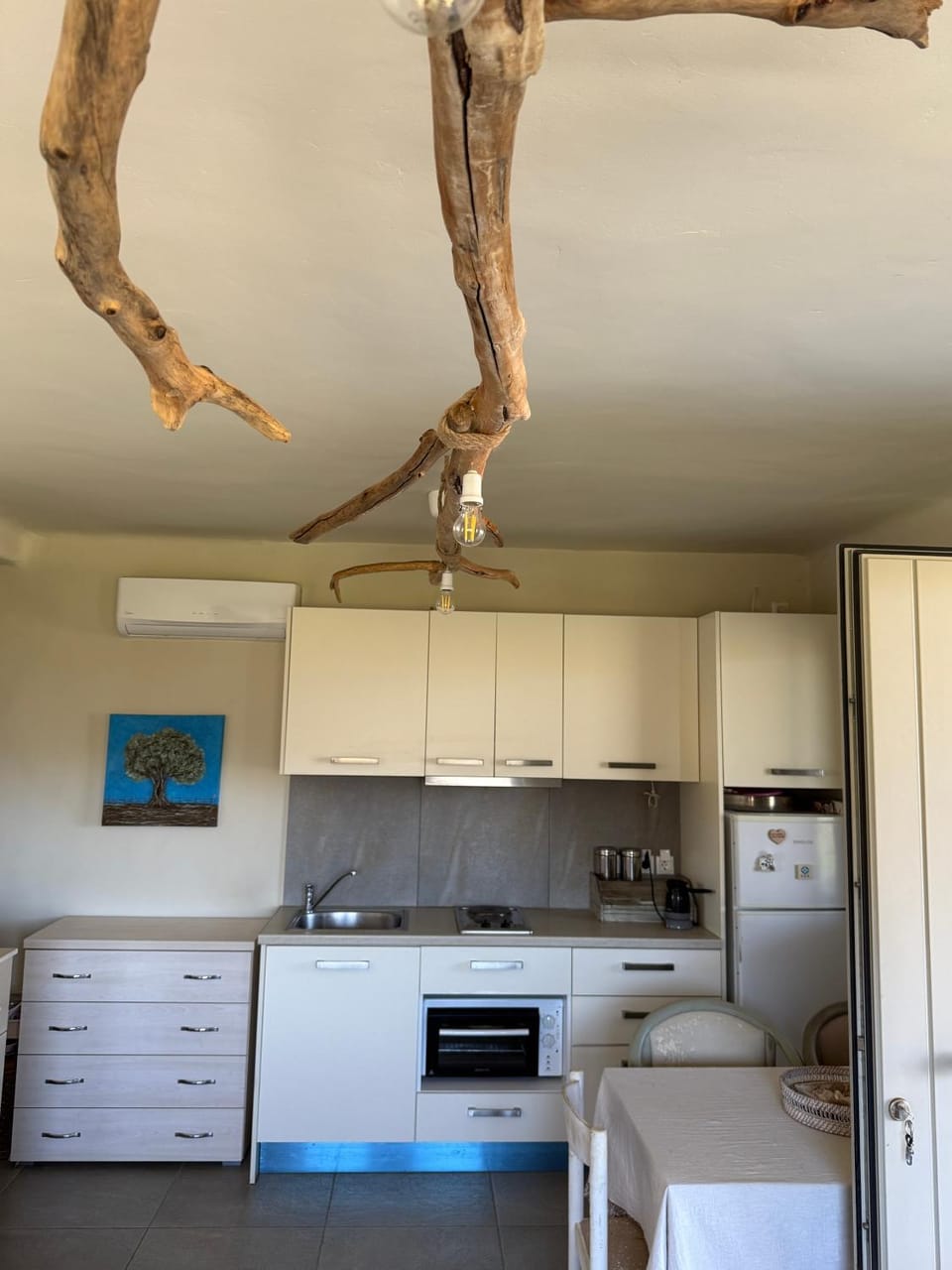 Kitchen or kitchenette, oven, stove