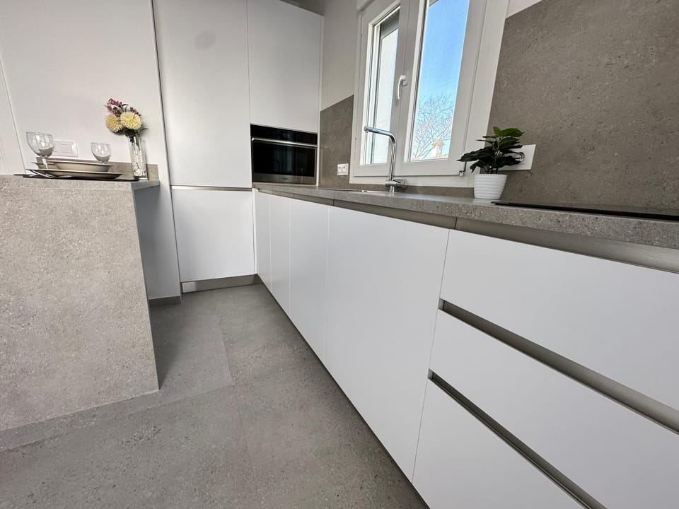 Kitchen or kitchenette, oven, stove