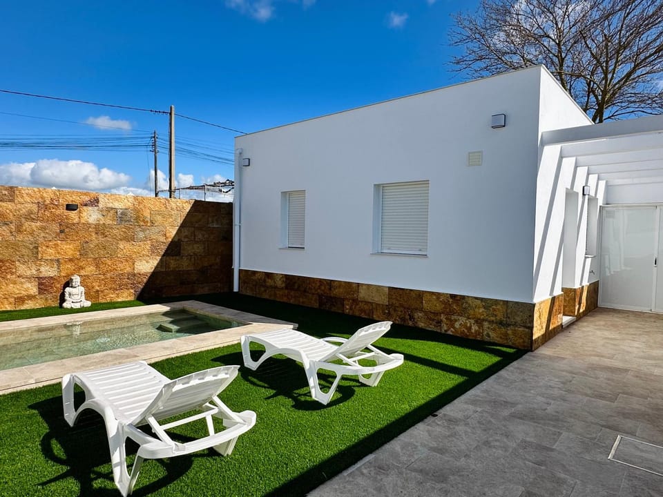Property building, Patio, Swimming pool, sunbed