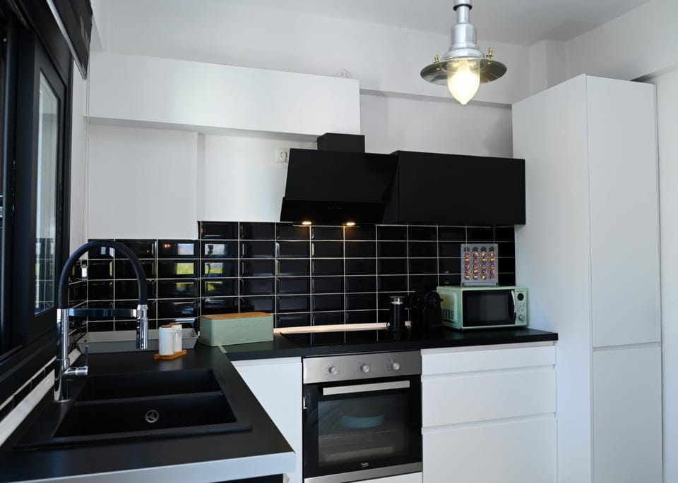 Kitchen or kitchenette, oven, stove