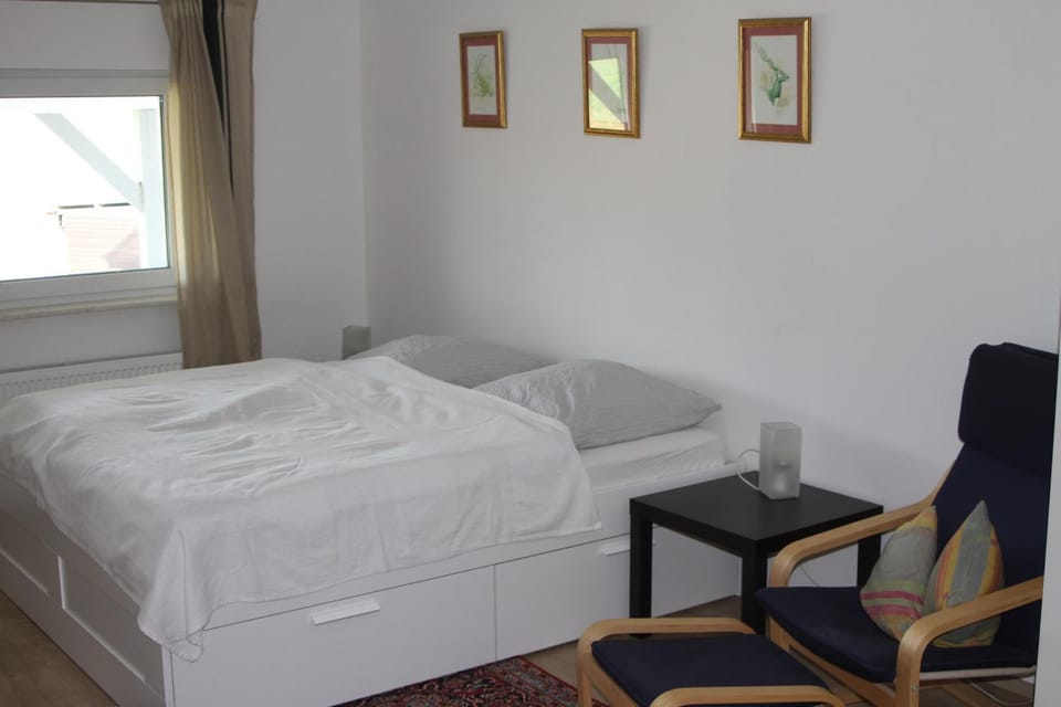 Bed, Seating area, Bedroom