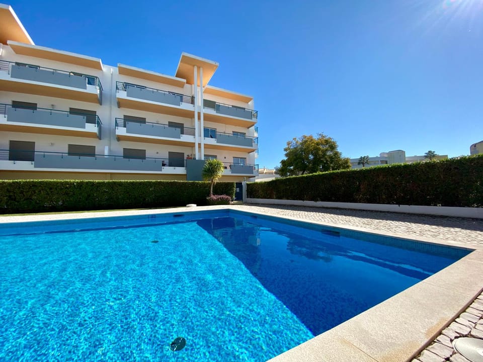 Property building, Pool view, Swimming pool, sunbed