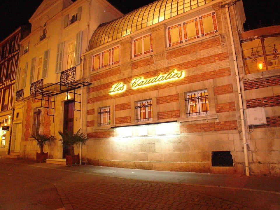 Facade/entrance, Night, Property logo or sign