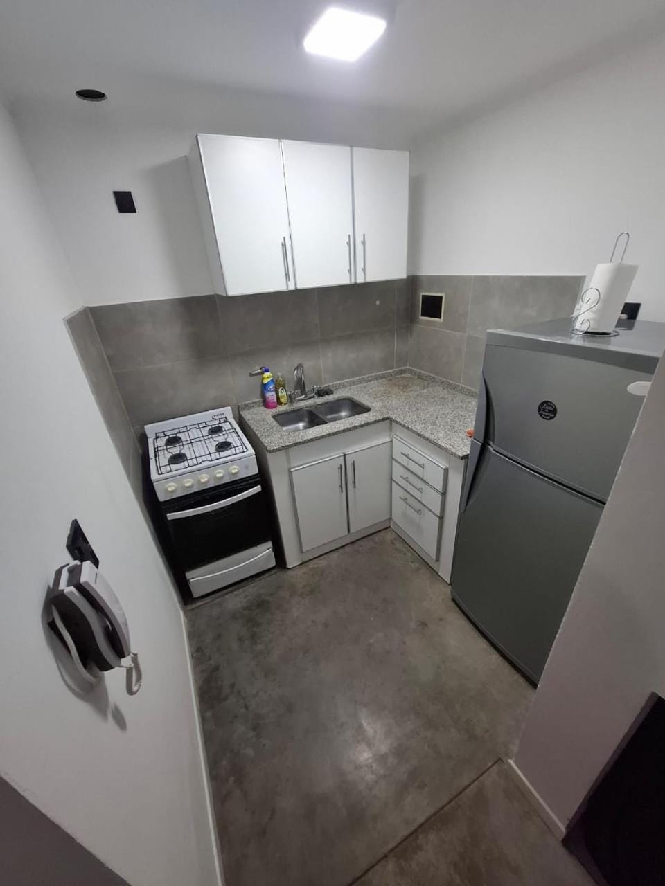 Kitchen or kitchenette, oven, stove