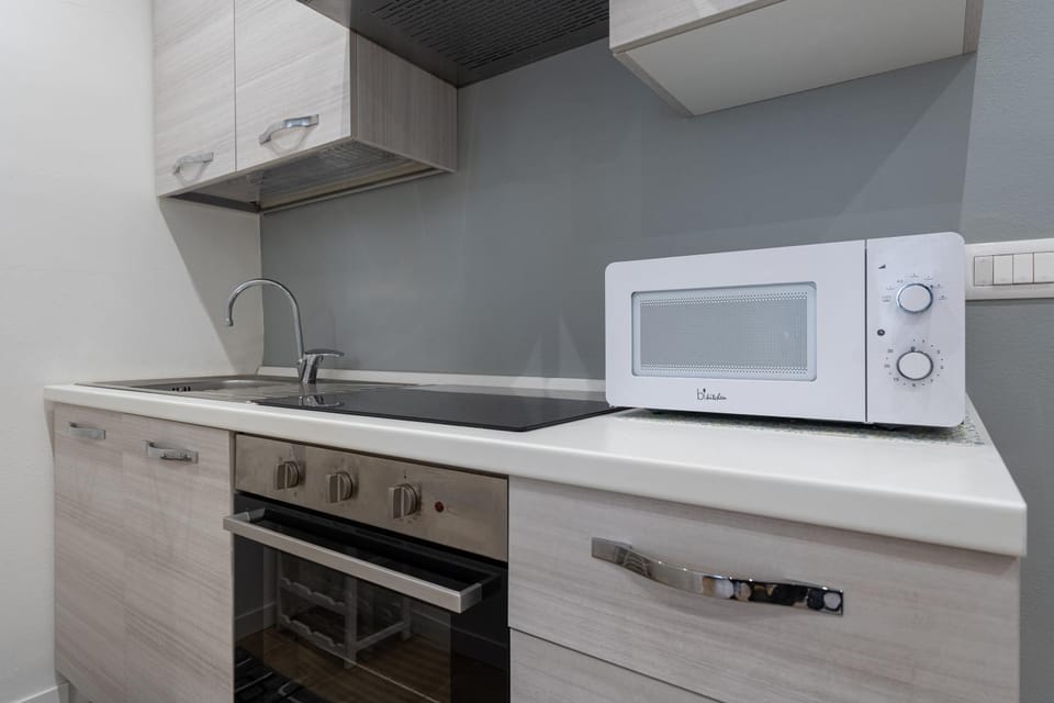 Kitchen or kitchenette, stove