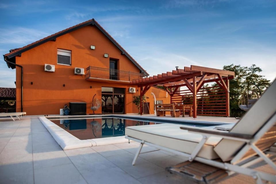 Property building, Patio, Day, Pool view, Swimming pool