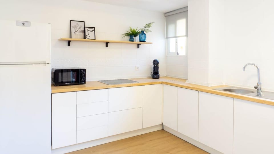 Kitchen or kitchenette, stove, toaster