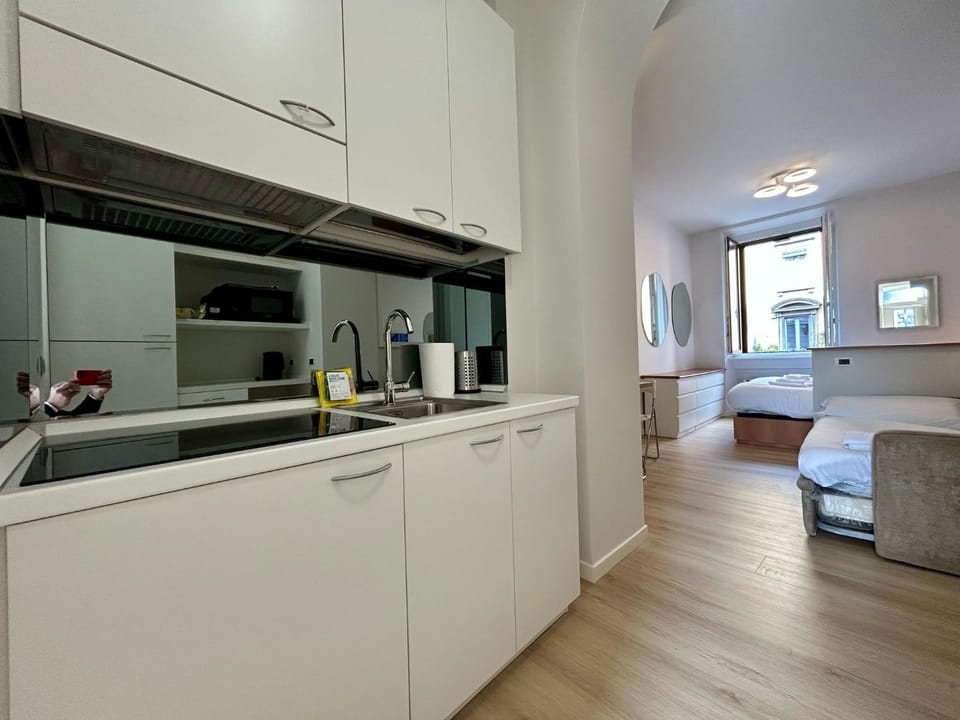Kitchen or kitchenette, Photo of the whole room, Seating area, stove