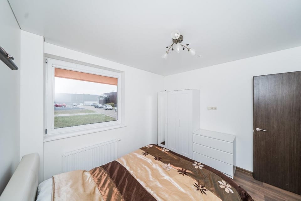 Erdvus triju kambariu butas, naujos statybos name Apartment in Lithuania