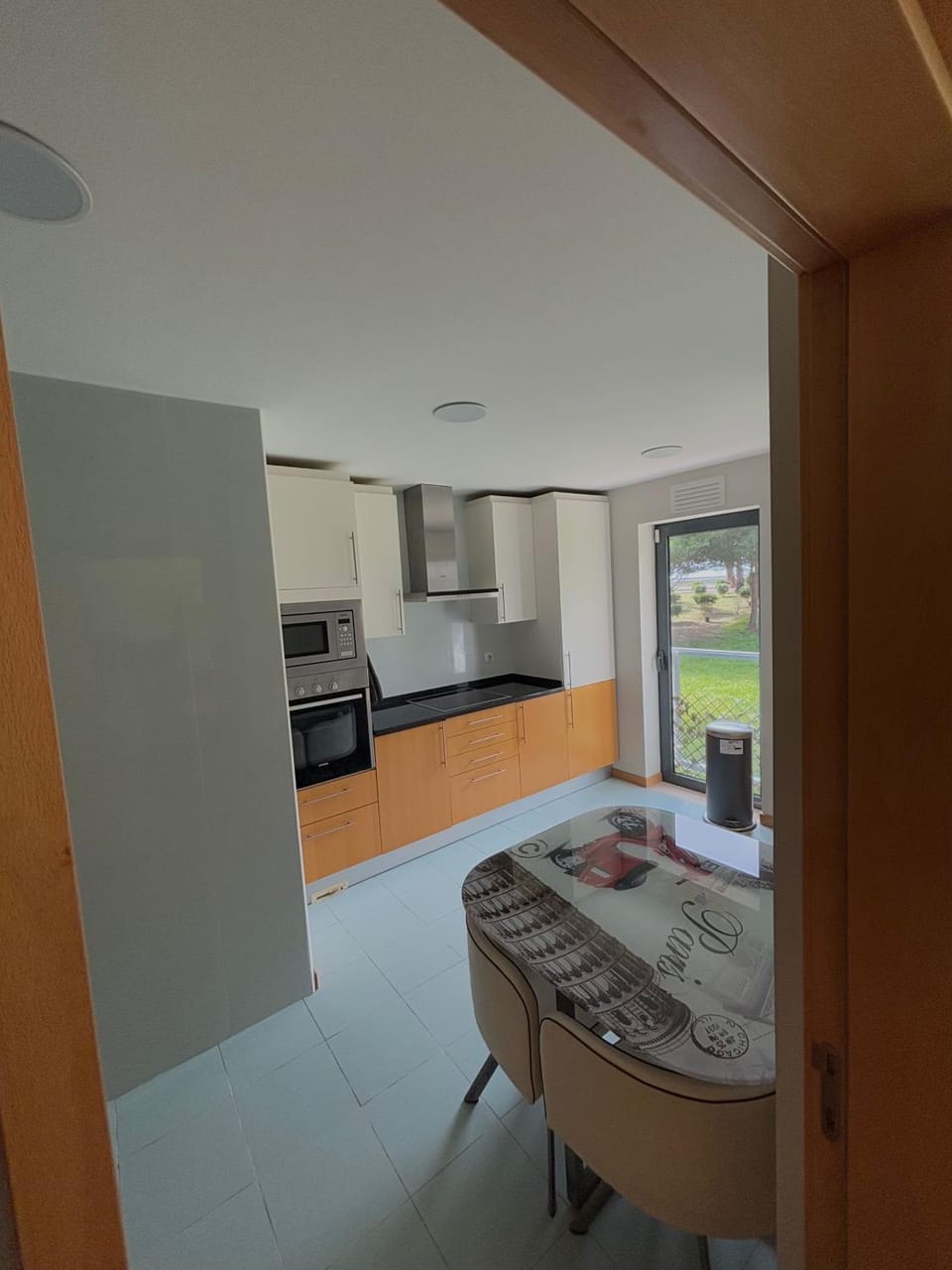 Kitchen or kitchenette, microwave, oven, stove