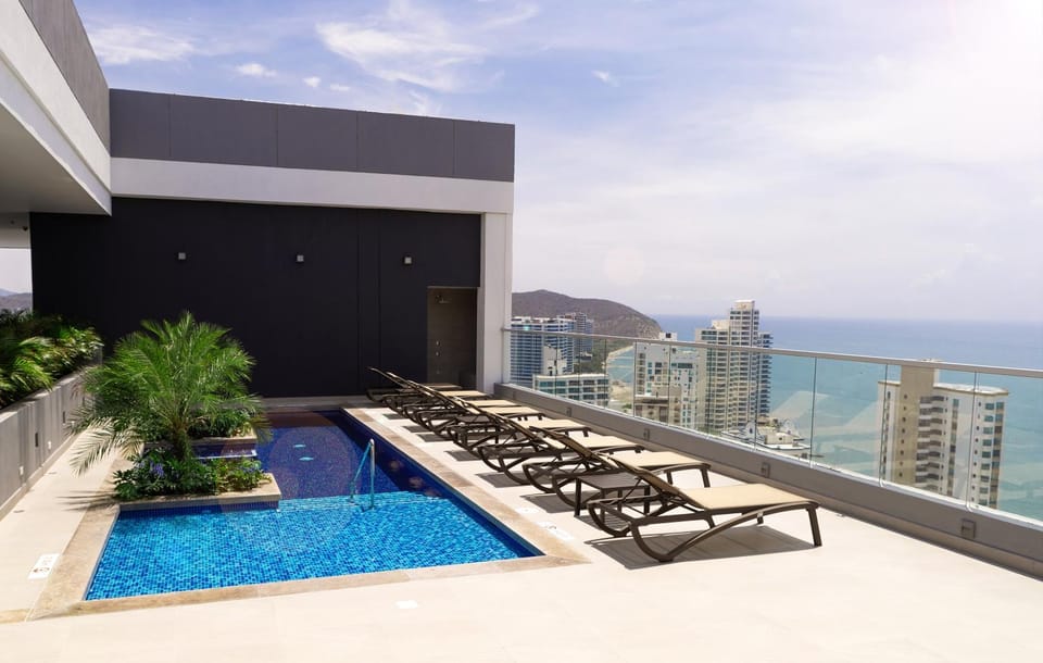 Property building, Day, Natural landscape, View (from property/room), Balcony/Terrace, Sea view, Swimming pool, sunbed
