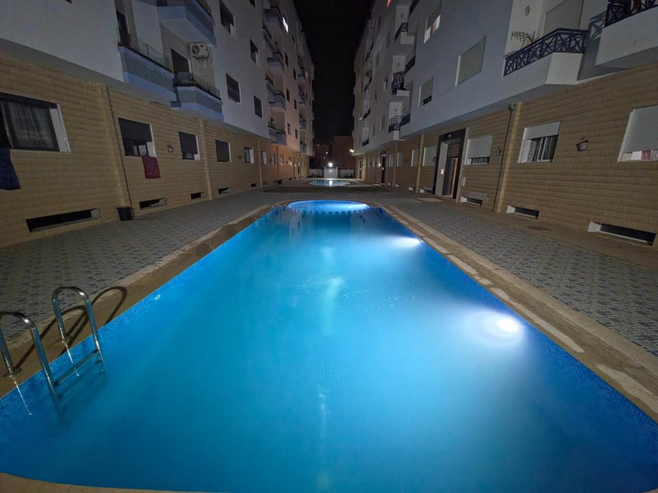 Property building, Night, Pool view, Swimming pool