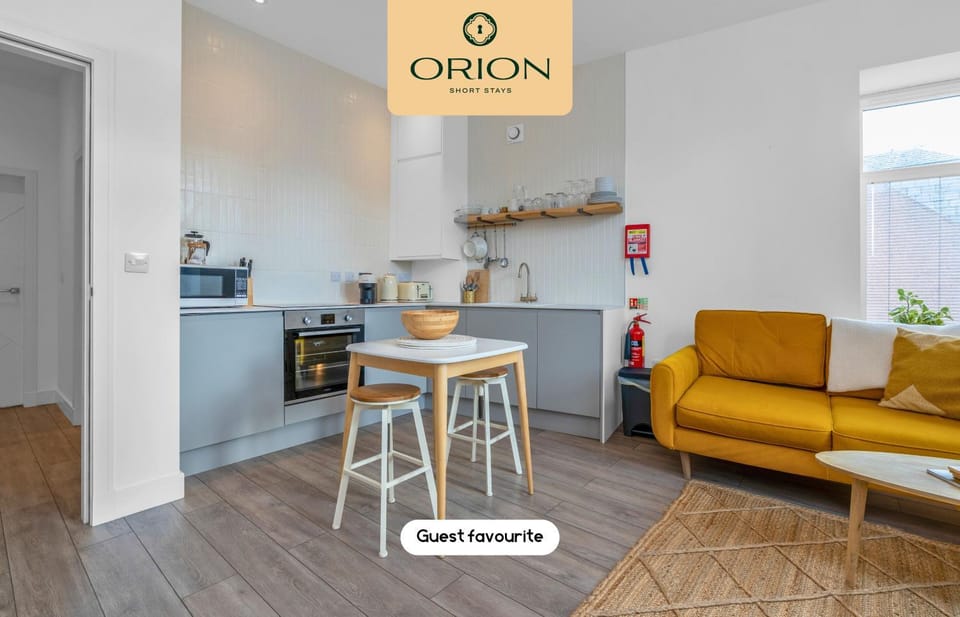 Living room, Seating area, Dining area, oven, stove, toaster