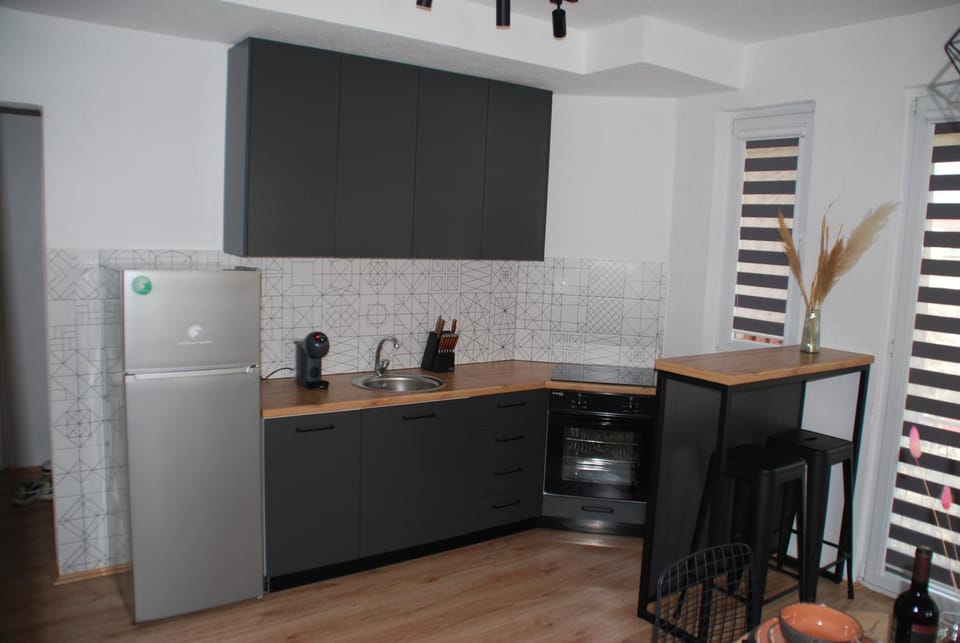 Kitchen or kitchenette, oven, stove