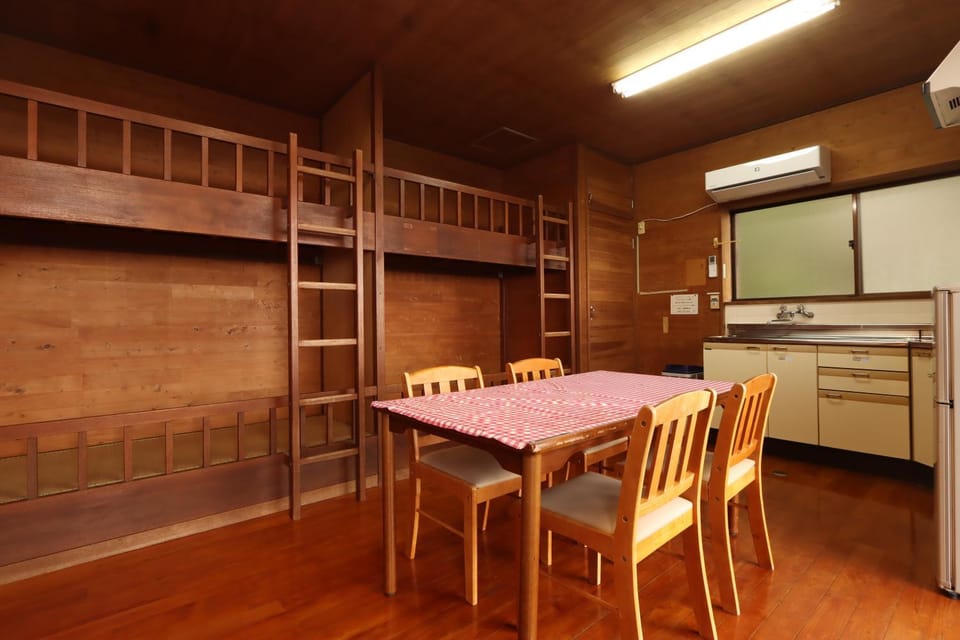 Kitchen or kitchenette, Photo of the whole room, Dining area, bunk bed, air conditioner